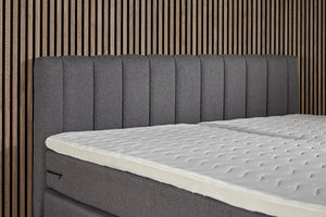 Antraciet Boxspring Comfort bed with built-in storage from Bedden.nl, featuring a sleek design and plush upholstery.