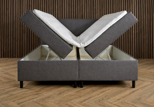 Comfortable Boxspring Essential with flat top and built-in storage, featuring a basic and supportive design from Bedden.nl.