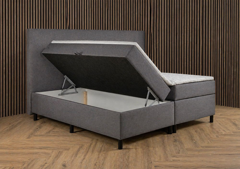 Basic Bedden.nl Boxspring Essential with storage, featuring a flat design and comfortable, supportive structure for a restful sleep.