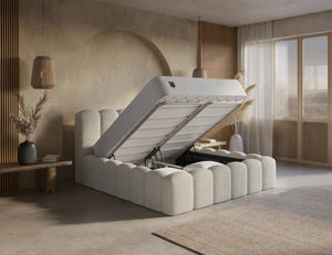 Beige Boxspring Harmony with built-in storage, including mattress and easy assembly, offering luxurious comfort and smart storage.